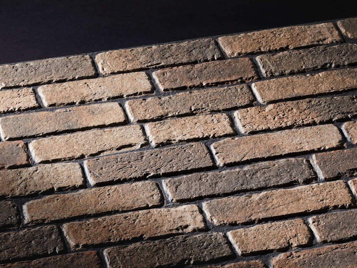 KMEW Facade Panel with realistic brick texture in beige and brown tones, reproducing natural brick warmth and detail