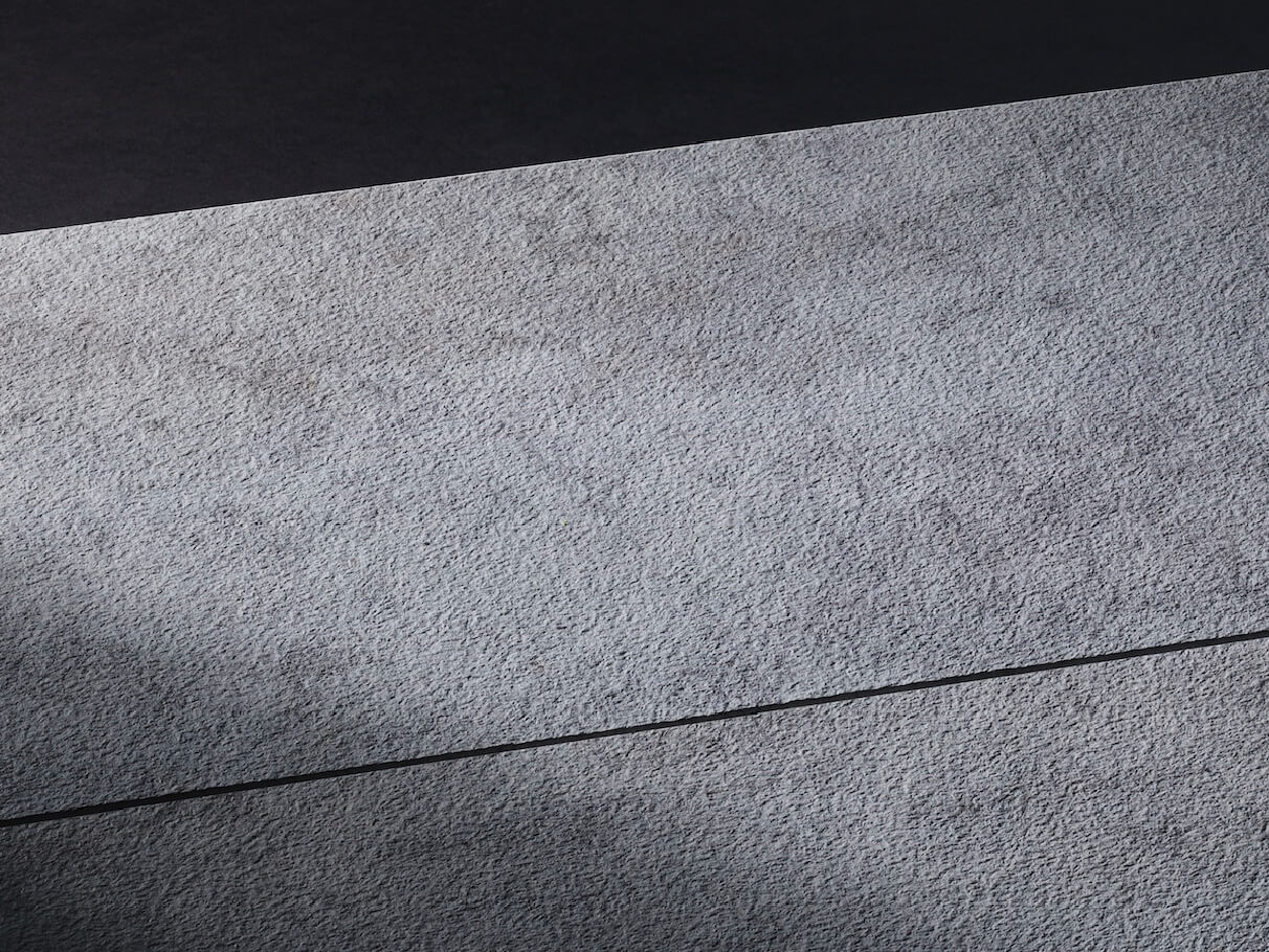 KMEW Facade Panel with gray concrete finish and smooth, minimal texture for a modern look